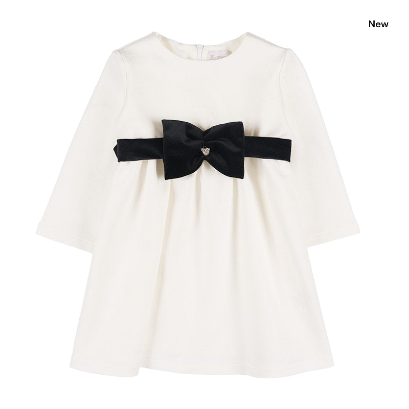 Abito panna con fiocco in velluto nero per neonata – Epperò