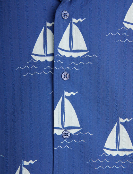 Camicia blu con stampa barche all over per bambino