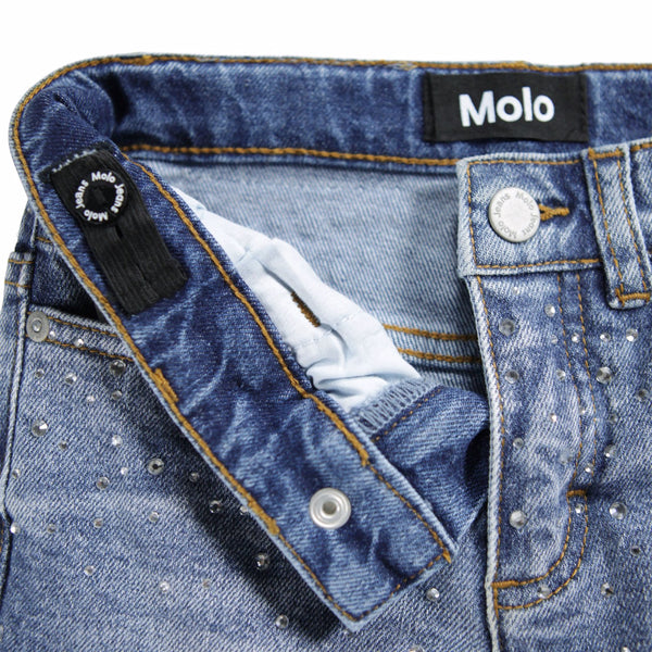 Jeans in denim blu con strass per bambina