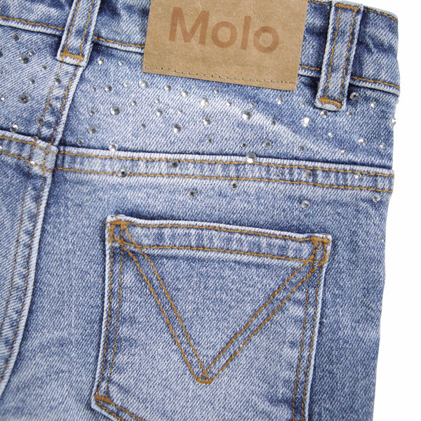 Jeans in denim blu con strass per bambina