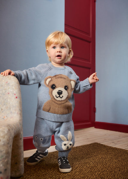 Maglia azzurra con ricamo per neonato