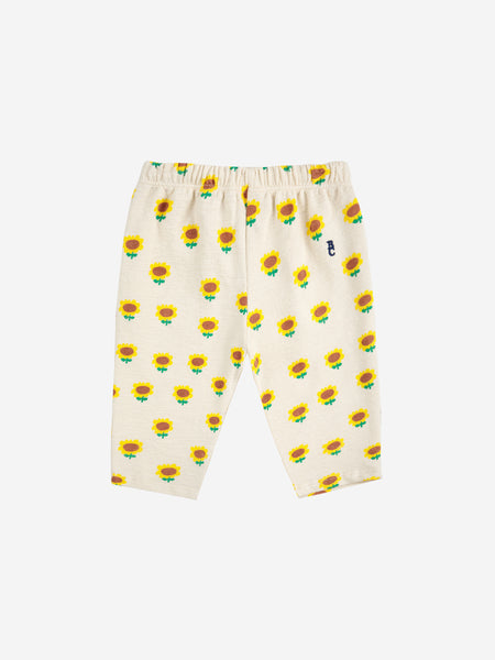 Pantalone con stampa girasoli all over per neonata