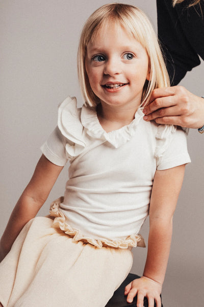 T-shirt bianca per neonata e bambina