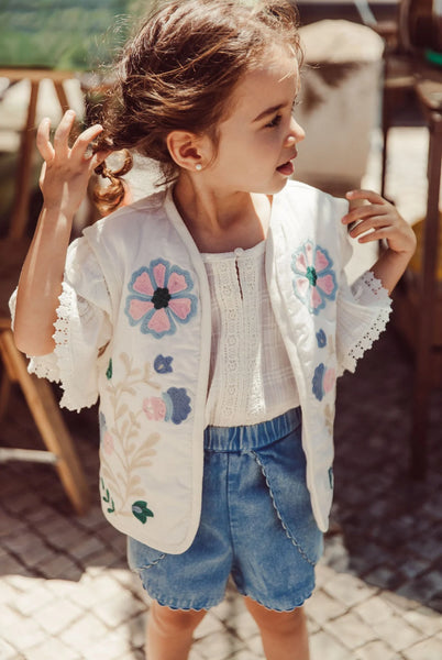 Gilet bianco con ricami per bambina