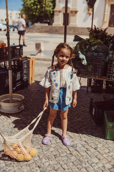 Gilet bianco con ricami per bambina