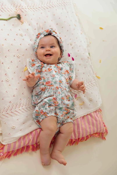 Blusa con stampa fiori all over per neonata