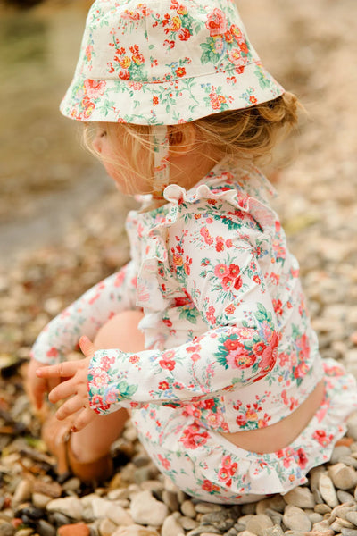 Blusa con stampa fiori all over per neonata