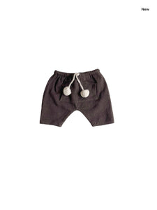 Pantalone moka con pompon per neonata