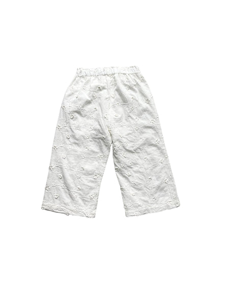 Pantalone bianco con ricami all over per neonata e bambina