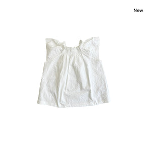 Blusa latte per neonata e bambina