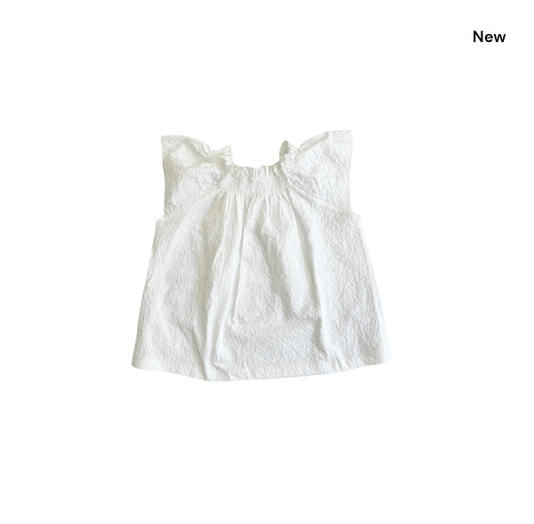 Blusa latte per neonata e bambina