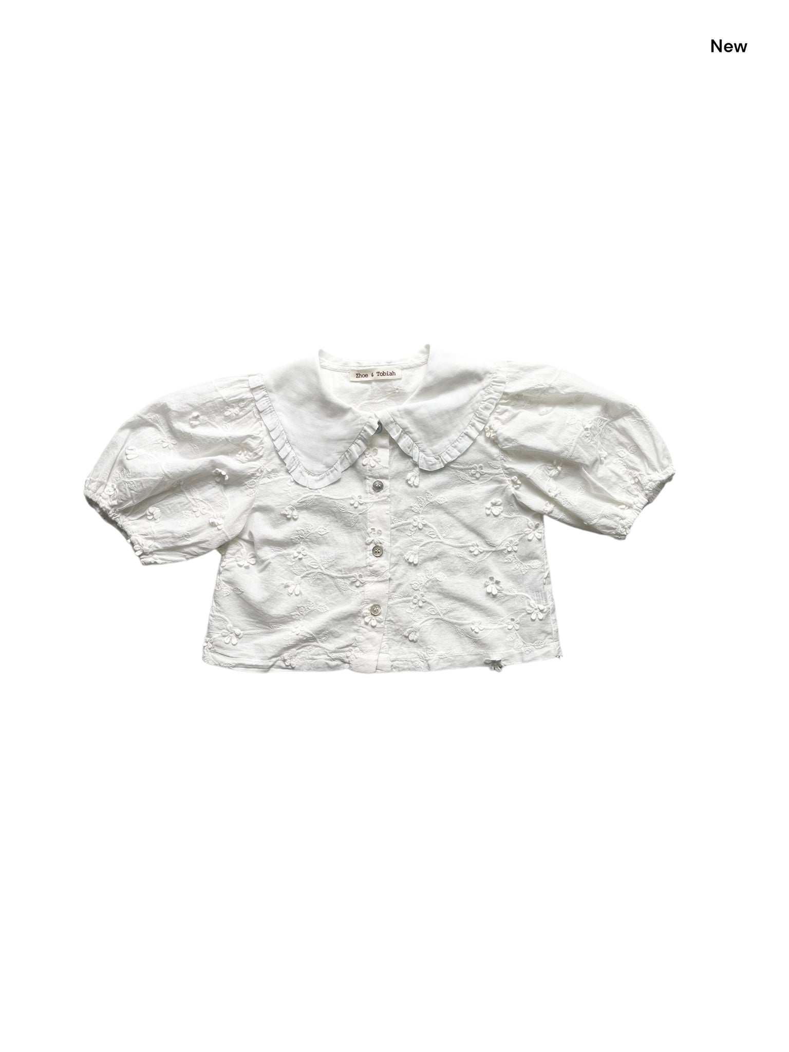 Camicia bianca con ricami all over per neonata e bambina
