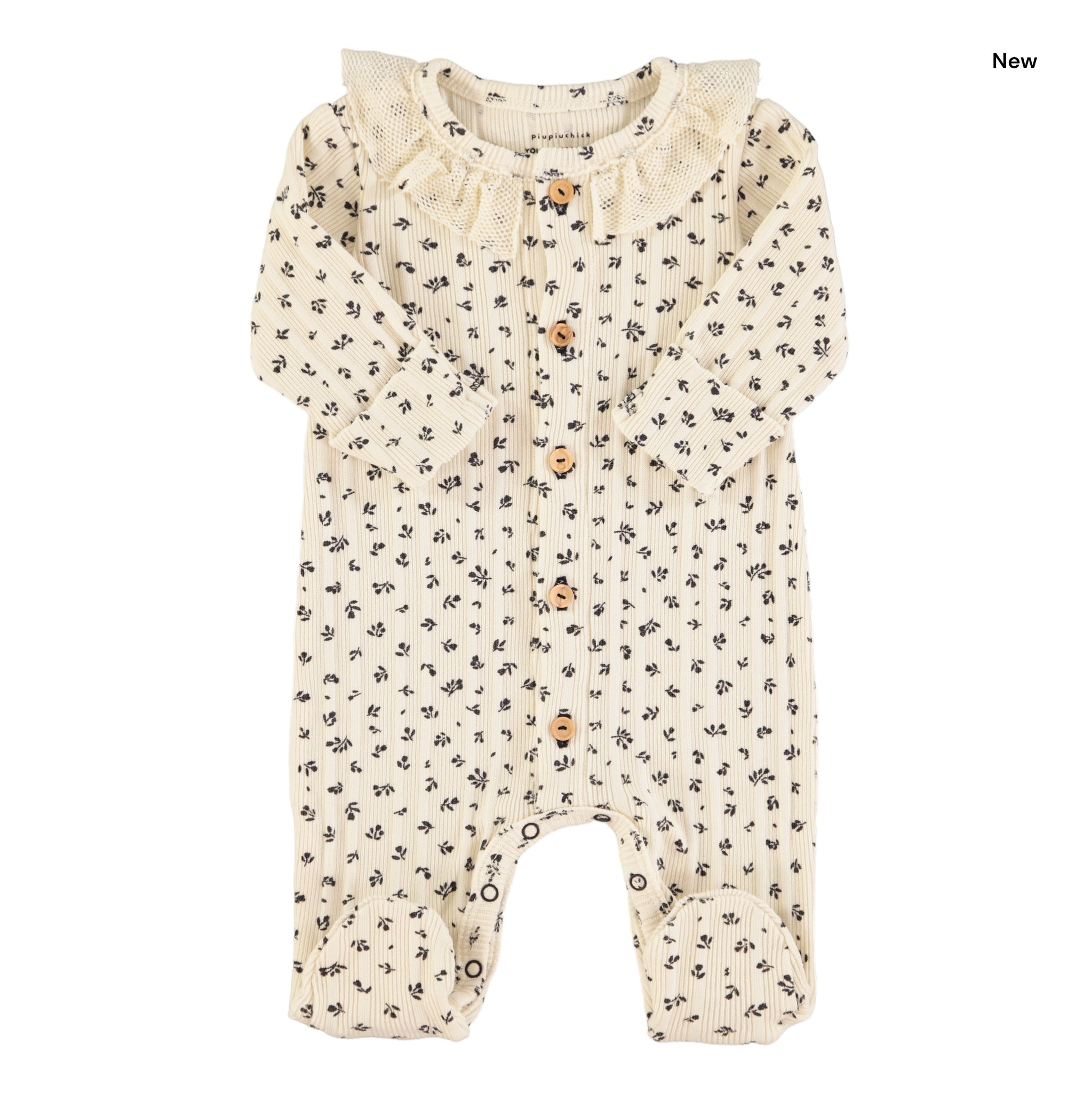 Tutina panna con stampa all over per neonata