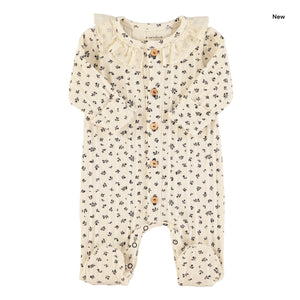 Tutina panna con stampa all over per neonata