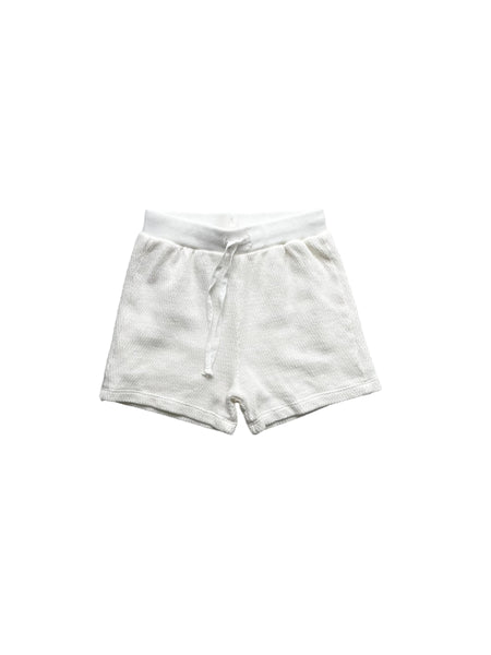 Short in maglia panna per neonata e bambina