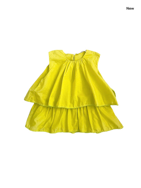 Top lime con balze per bambina