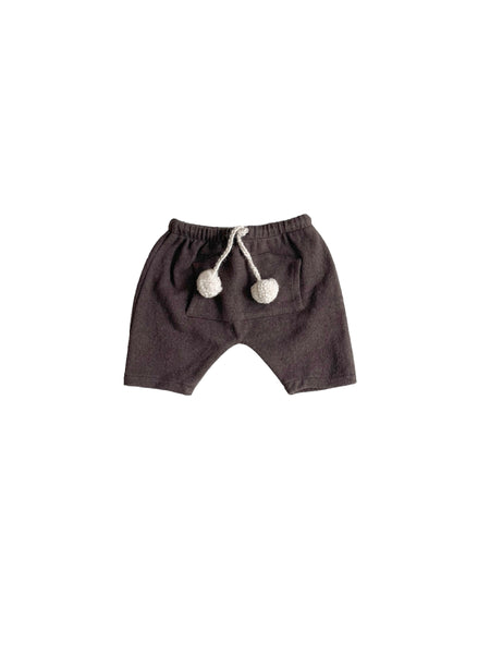 Pantalone moka con pompon per neonata