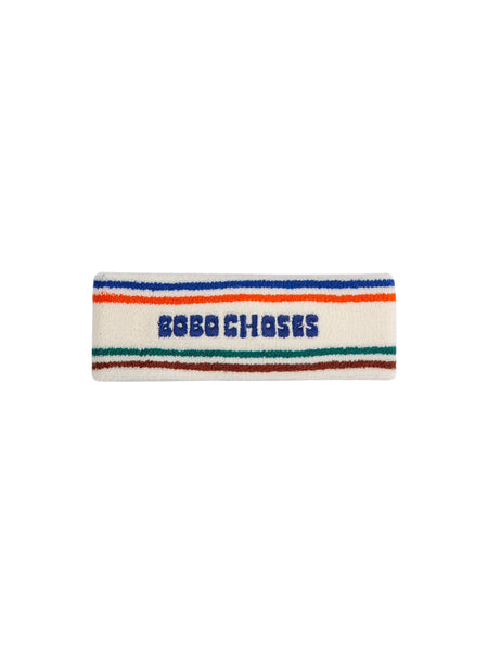 Fascia in spugna bianca con righe multicolor e logo per bambini