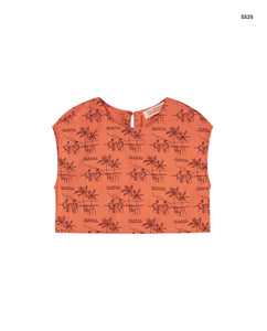 Top arancio con stampa per bambina