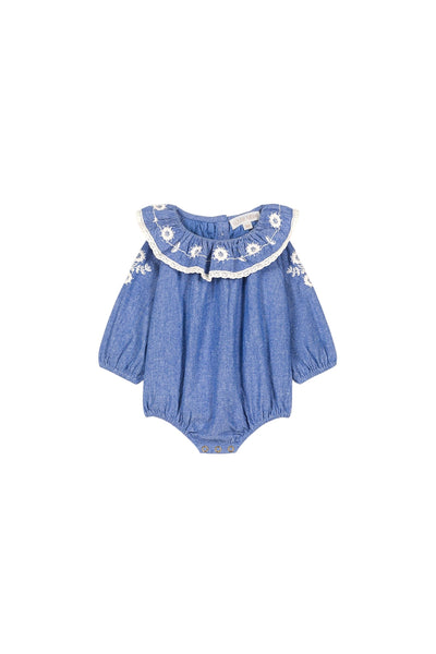 Tutina blu con ricami per neonata
