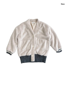 Cardigan in eco pelliccia beige per bambina