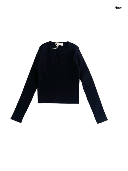 Maglia nera a costine per bambina