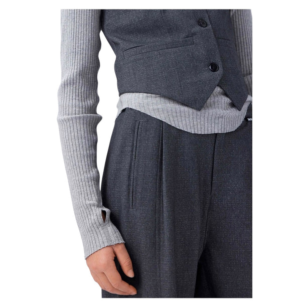 Gilet grigio con filo argentato per bambina