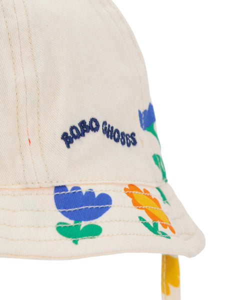 Cappello alla pescatora panna con stampa fiori all over per neonata
