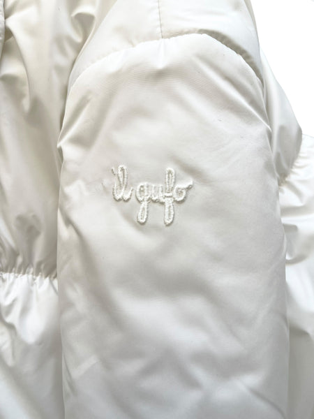 Piumino bianco con cappuccio per neonata