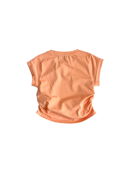 T-shirt cropped pesca con logo per bambina
