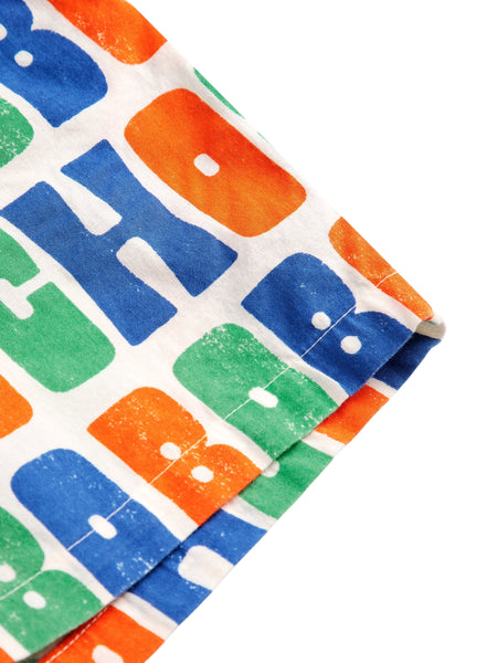 Short con stampa logo multicolor all over per neonato e bambino