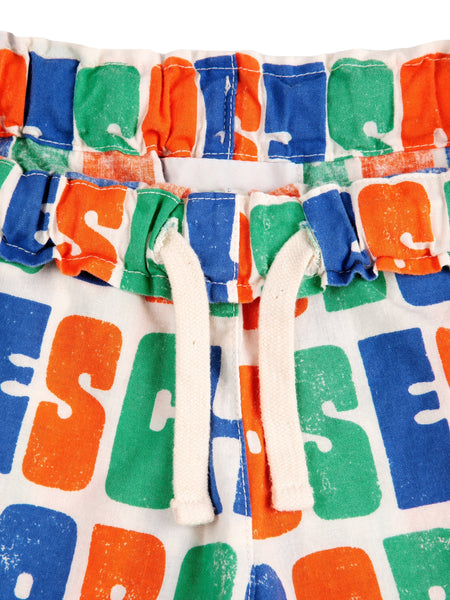 Short con stampa logo multicolor all over per neonato e bambino