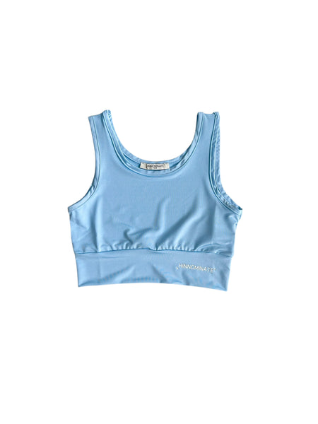 Top azzurro polvere con logo per bambina