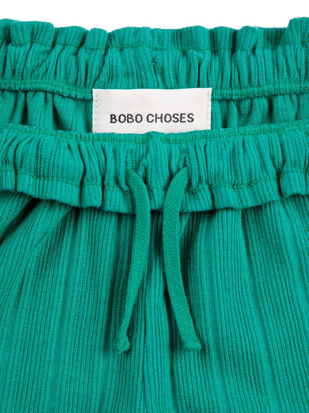 Short verde con logo per neonata e bambina