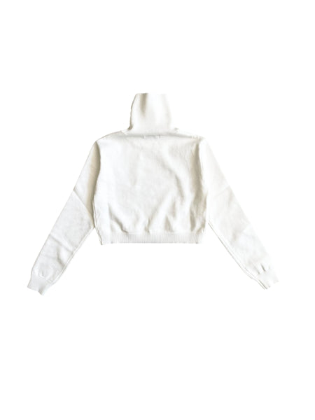 Dolcevita in maglia latte per bambina