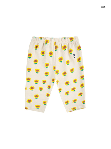 Pantalone con stampa girasoli all over per neonata