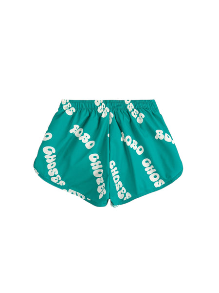 Costume verde con logo all over per neonato e bambino