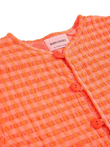 Giacca imbottita vichy arancio e fucsia per neonata e bambina