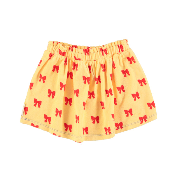 Gonna in spugna gialla con fiocchi rossi per bambina