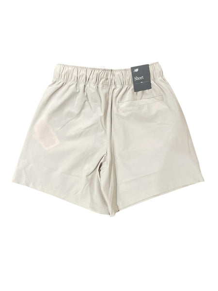 Short beige con logo per bambino New Balance YB6148O8 TIMBERWOLF 