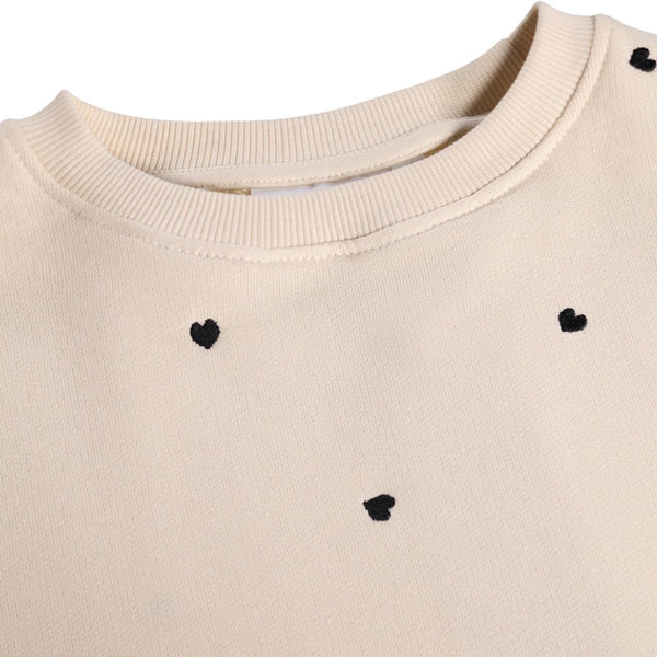 Felpa beige con cuori ricamati per neonata e bambina Molo MIKI 9536 