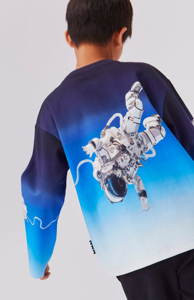 T-shirt blu con stampa astronauti all over per neonato e bambino