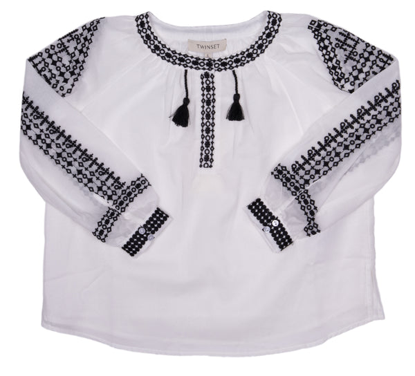 Blusa bianca con dettagli per bambina