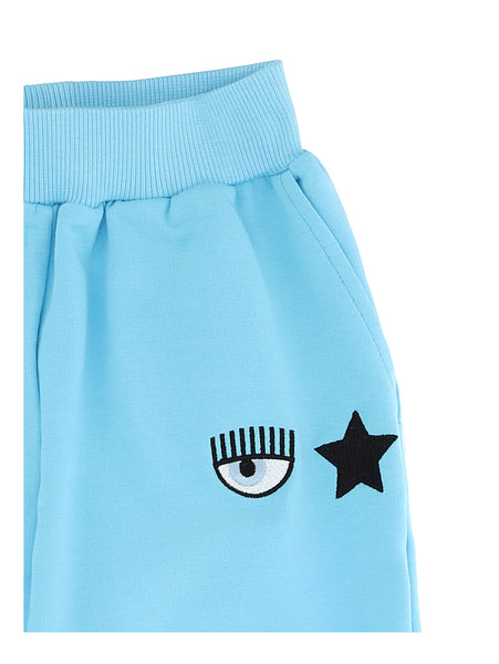 Pantalone azzurro con dettagli logo per bambina